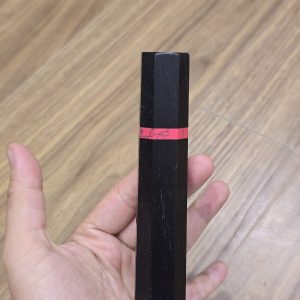 African blackwood wa handle with a black buffalo horn ferrule, pink coral ring and pink coral end cap