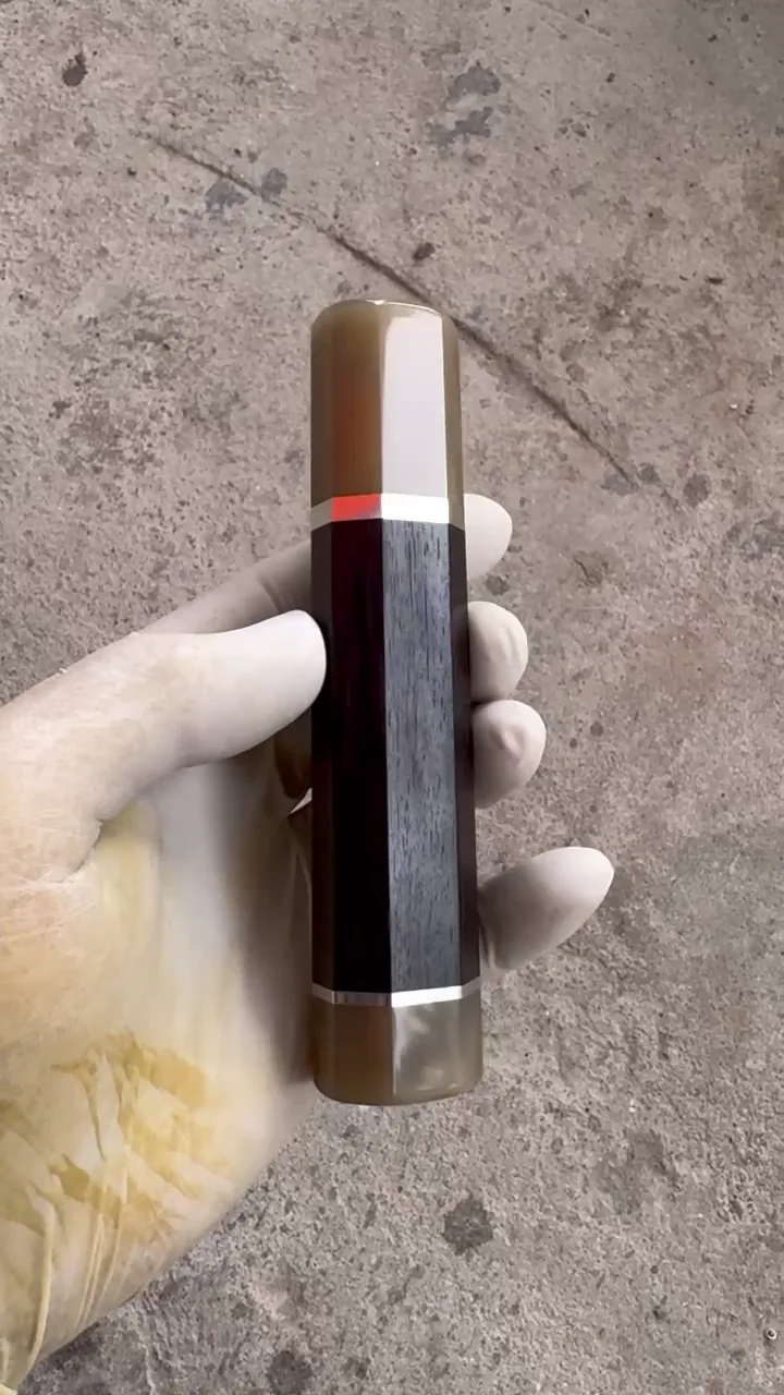 African blackwood wa handle turned in the hand