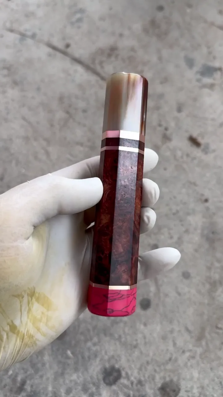 Amboyna burl wa handle turned in the hand