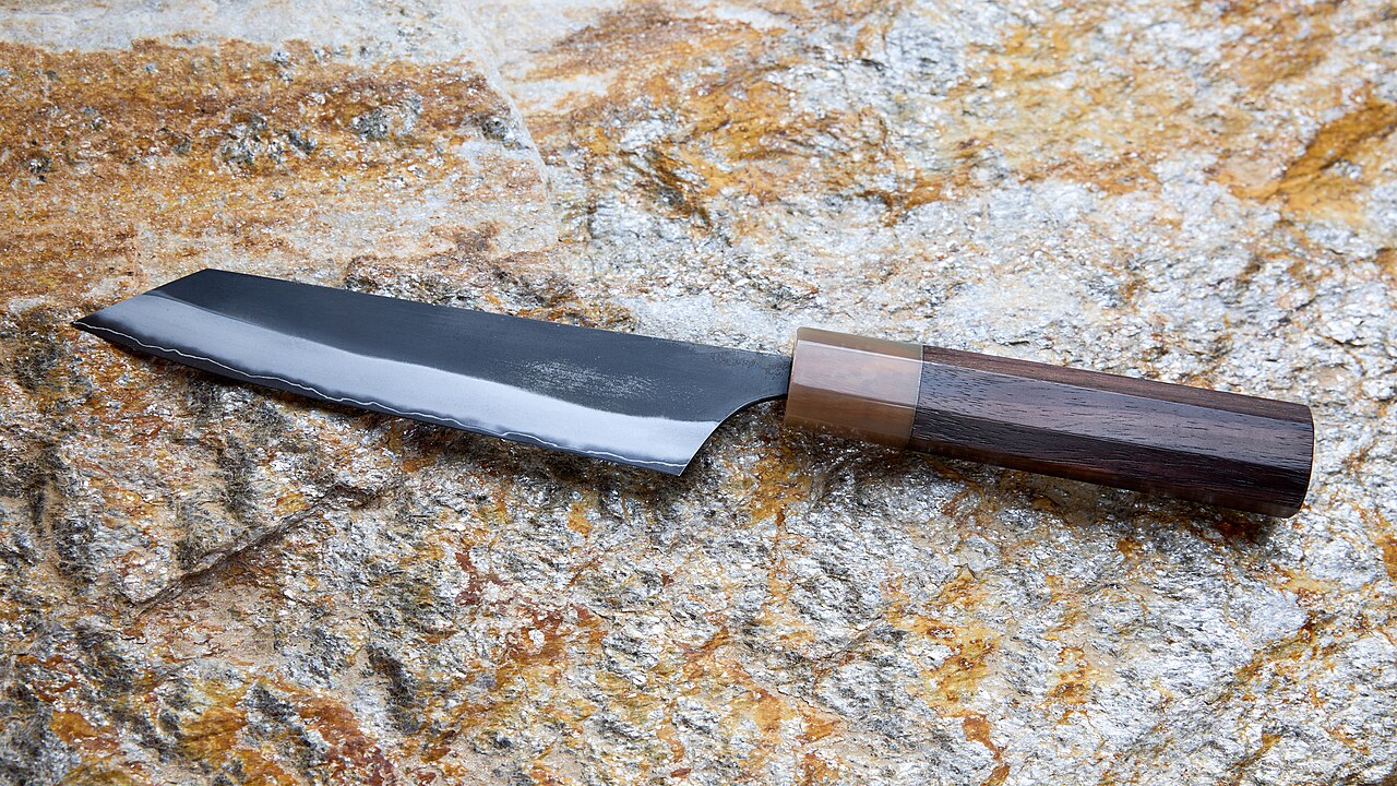 Masashi Kokuen petty knife with dark blade face, bright bevel and wooden handle
