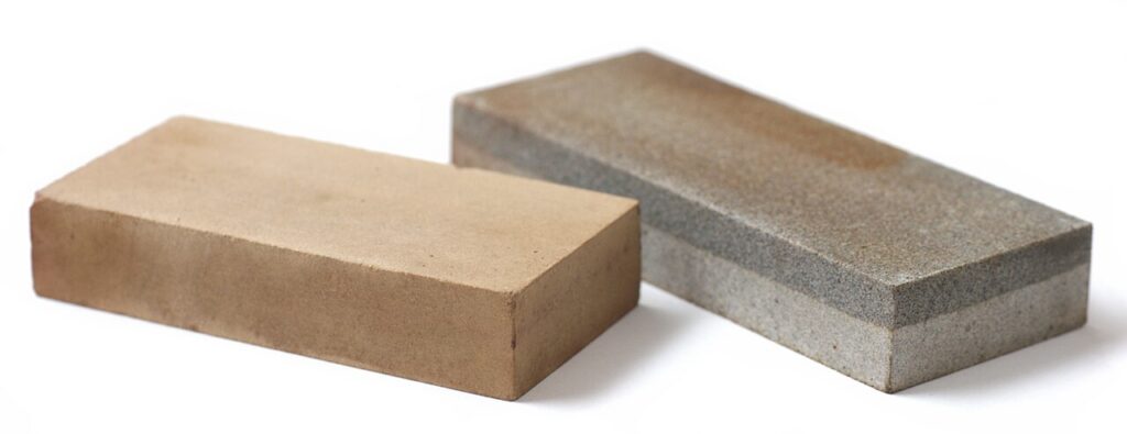 Two rectangular whetstones, including a two-layer combination stone