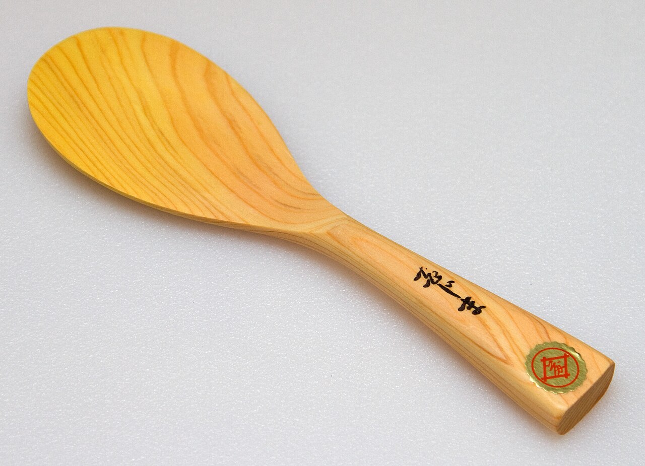 Wooden shamoji with a broad, shallow paddle face