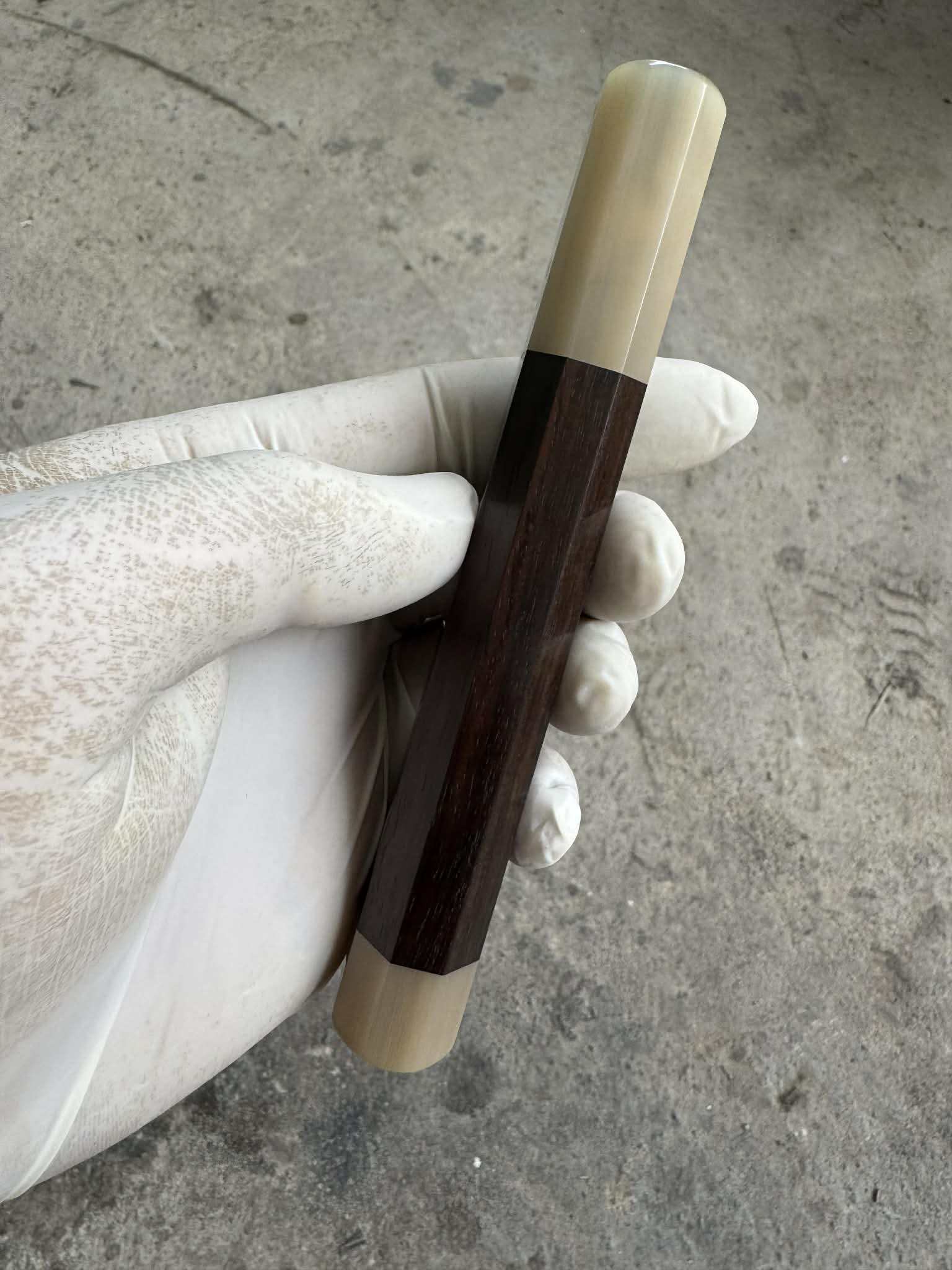 African blackwood wa handle with cream horn ferrule side view
