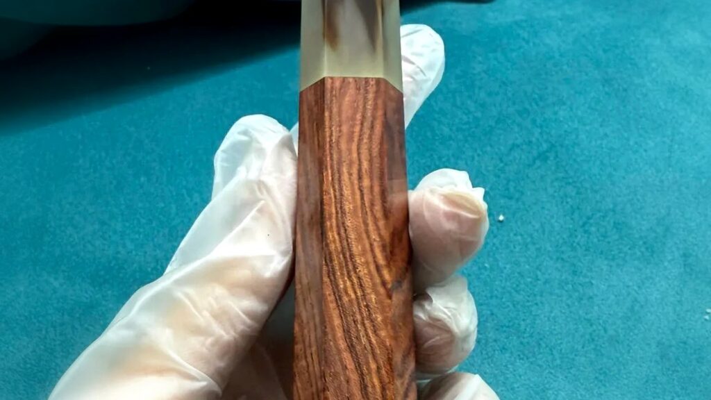 Zebrawood, bocote, and black palm grain patterns in handle stock