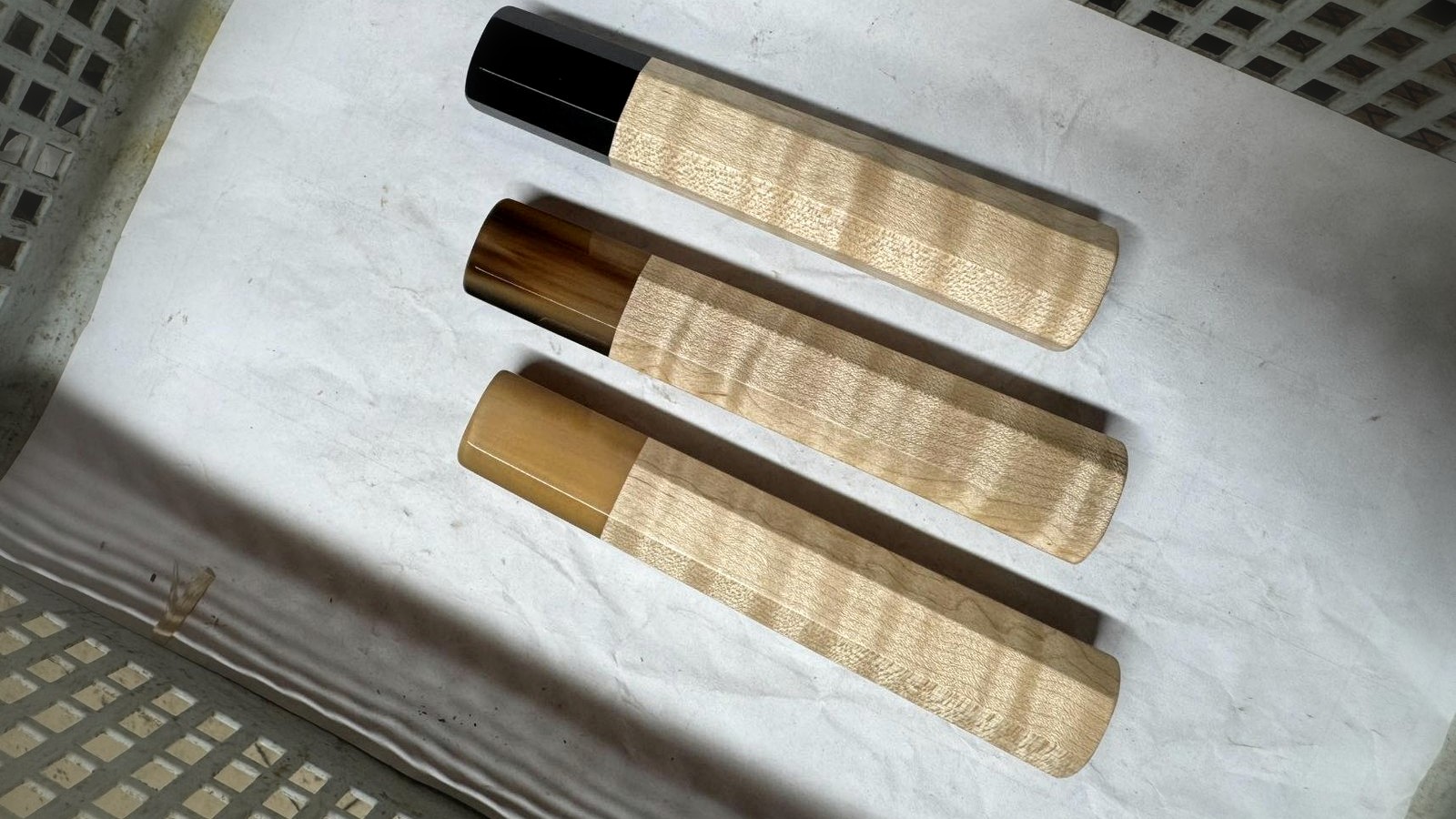 Brown horn ferrules with rosewood and walnut wa handles